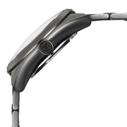 Titan 10011QM02 watch side profile showing dark gun case and crown