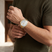 Titan 10076BM04 men's Vetra automatic watch with white dial and multicoloured stainless steel strap, watch shown on wrist