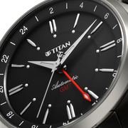 Titan 10076QM01 men's Vetra automatic watch with black dial and grey stainless steel strap, close-up of the dial