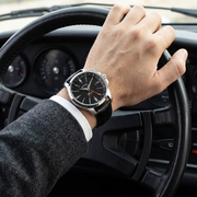 Titan 10076SL02 men's Vetra automatic watch with black dial and black leather strap, watch shown on wrist