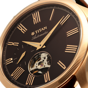 Titan 10076WL01 men's Vetra automatic watch with maroon dial and brown leather strap, close-up of the dial