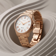 Titan 10076WM01 men's Vetra automatic watch with white dial and pink stainless steel strap, alternate angled product view