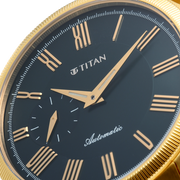 Titan 10076YM02 men's Vetra automatic watch with green dial and golden stainless steel strap, close-up of the dial
