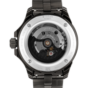 Titan 10077QM01 men's Vetra automatic watch with slate grey dial and grey stainless steel strap, exhibition caseback showing the automatic movement