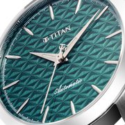 Titan 10077SL03 men's Vetra automatic watch with teal dial and black leather strap, close-up of the dial