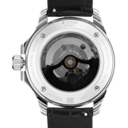 Titan 10077SL03 men's Vetra automatic watch with teal dial and black leather strap, exhibition caseback showing the automatic movement