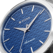Titan 10077SM01 men's Vetra automatic watch with blue dial and silver stainless steel strap, close-up of the dial