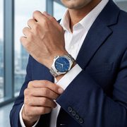 Titan 10077SM01 men's Vetra automatic watch with blue dial and silver stainless steel strap, watch shown on wrist