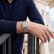 Titan 10077SM02 men's Vetra automatic watch with white dial and silver stainless steel strap, watch shown on wrist