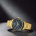 Titan 1688KM05 Regalia Premium Quartz Multifunction Analog Watch with Blue Dial and Gold-Tone Stainless Steel Strap for Men