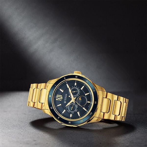 Titan 1688KM05 Regalia Premium Quartz Multifunction Analog Watch with Blue Dial and Gold-Tone Stainless Steel Strap for Men