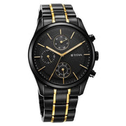 Titan 1805KM06 black dial watch with black stainless steel strap and gold-tone accents, close-up of dial and bracelet