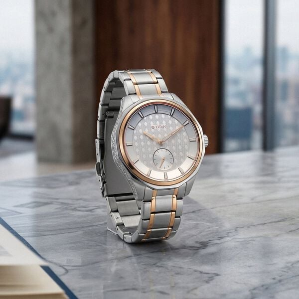 Titan 1829KM08 Regalia Opulent Analog Watch with White Dial and Rose Gold Bimetal Strap for Men 49mm