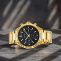 Titan 1829YM01 Regalia Opulent Quartz Multifunction Watch with Black Dial and Golden Stainless Steel Strap for Men 43mm