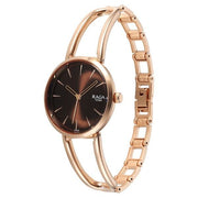 Titan 2746WM01 Raga Afterglow women's watch with brown dial and rose gold metal strap, angled view showing the rose gold bracelet