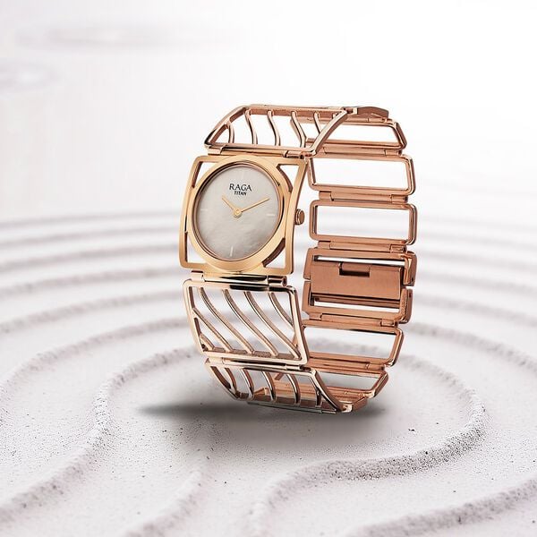 Titan 2769WM01 Raga Ethereal Quartz Analog Watch with White Mother of Pearl Dial and Rose Gold Stainless Steel strap for Women 28mm