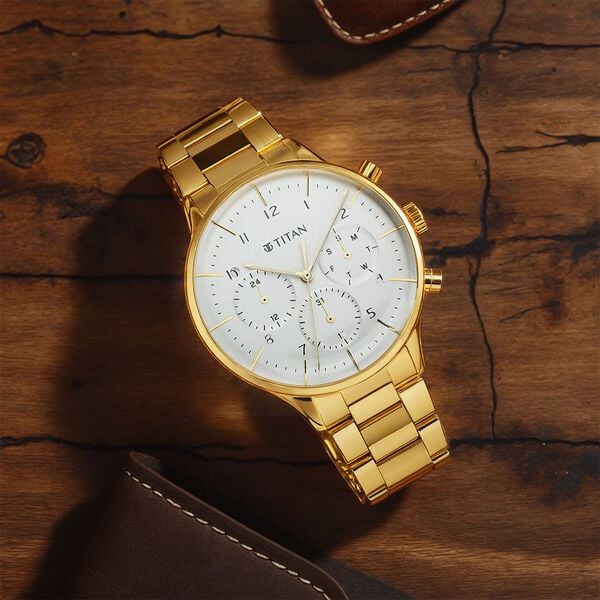 Titan 90102YM01 Urban Magic Quartz Multifunction Watch with Silver Dial and Gold Stainless Steel Strap for Men 42mm