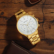 Titan 90102YM01 Urban Magic watch with silver dial and gold stainless steel strap, main product image