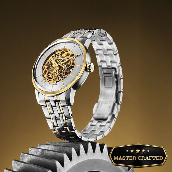 Titan 90110BM01 Golden Heart Automatic Analog Watch with Silver and Gold Skeleton Dial and Two-Tone Stainless Steel Strap for Men 44mm