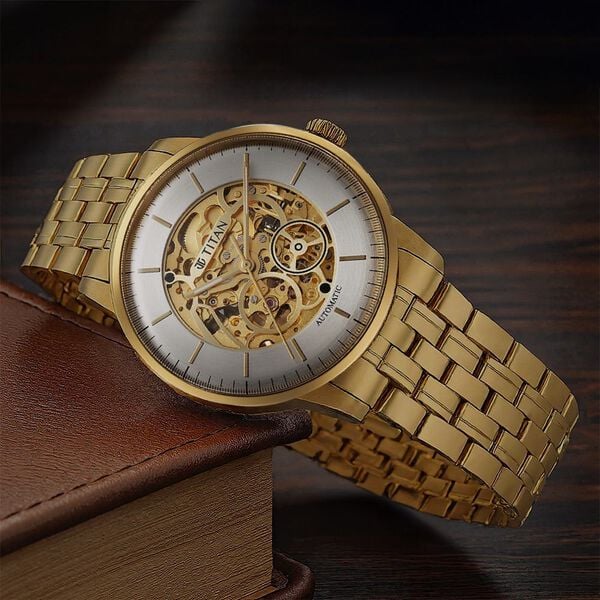 Titan 90110YM01 Golden Heart Automatic Analog Watch with Silver and Gold Dial and Gold Stainless Steel Strap for Men 44mm