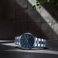 Titan 90142QD01 Slim Ceramic Fusion Quartz Analog Watch with Date, Blue Dial and Blue Stainless Steel Strap for Men 47mm
