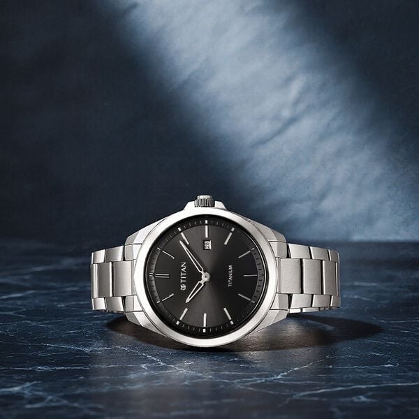 Titan 90177TM03 Titanium Quartz Analog Watch with Black Dial and Silver Titanium Strap for Men