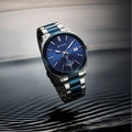 Titan 90189KM01 Classique Suave Quartz Analog Watch with Date, Blue Dial and Silver and Blue Stainless Steel Strap for Men 43mm