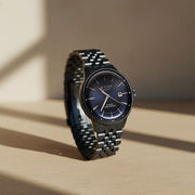 Titan 90201QM01 blue dial watch with blue stainless steel strap — official gallery image 1