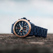 Titan 90253KM02 blue dial watch with blue strap, front view showing the dial and markers