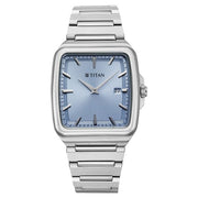 Titan 90260SM01 blue dial watch with silver strap, front view showing the dial and markers