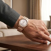 Titan 90261WM01 rose gold dial watch with rose gold strap, watch shown worn on the wrist