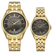 Titan 9401594215YM01 Modern Bandhan couple watch with black dial and yellow gold strap, primary product view