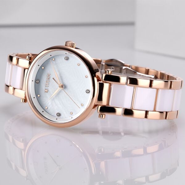 Titan 95061WD04 Purple Ceramics Quartz Analog Watch with White Dial and Two-Tone Ceramic Strap for Women