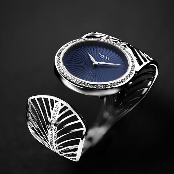 Titan 95221VM01 Raga Silver Quartz Analog Watch with Blue Dial and Sterling Silver Strap for Women 33mm