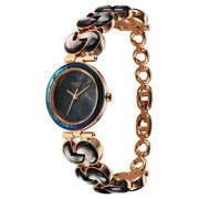Titan 95233WM02F women's watch with rose gold strap and round case