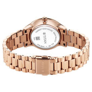 Titan 95247WM02 white dial watch with rose gold strap, side view showing the case profile and strap