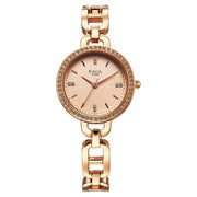Titan 95305WM01 Raga watch front view showing the rose gold dial and markers