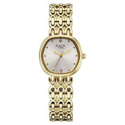 Titan 95421YM01 Raga Spotlight women's watch with white dial and golden metal strap, front view of the white dial and golden strap