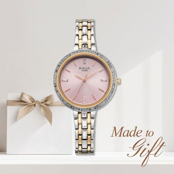 Titan 95424KM01 Raga Spotlight Quartz Analog Watch with Pink Dial and Two-Toned Metal Strap for Women 32.5mm