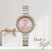 Titan 95424KM01 Raga Spotlight women's watch with pink dial and two-toned metal strap
