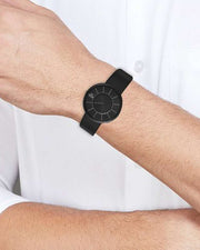 Titan 10003NL02 40.5mm men's analog watch with black dial, black leather strap and sapphire glass