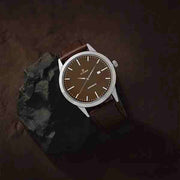 Titan 1584SL04 men's watch with brown round dial and brown leather strap