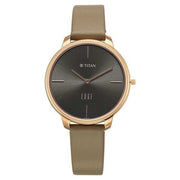 Titan 2654WL01 Edge black dial quartz analog watch with black leather strap for women 35mm