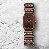 Titan 95154QM01 Raga Love All brown dial quartz analog watch with brown metal strap for women 20mm